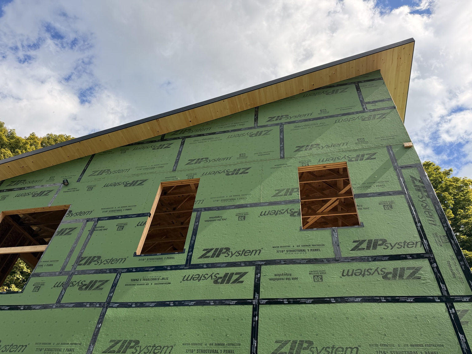 Northfield New Build — Upper-story sheathing and window openings
